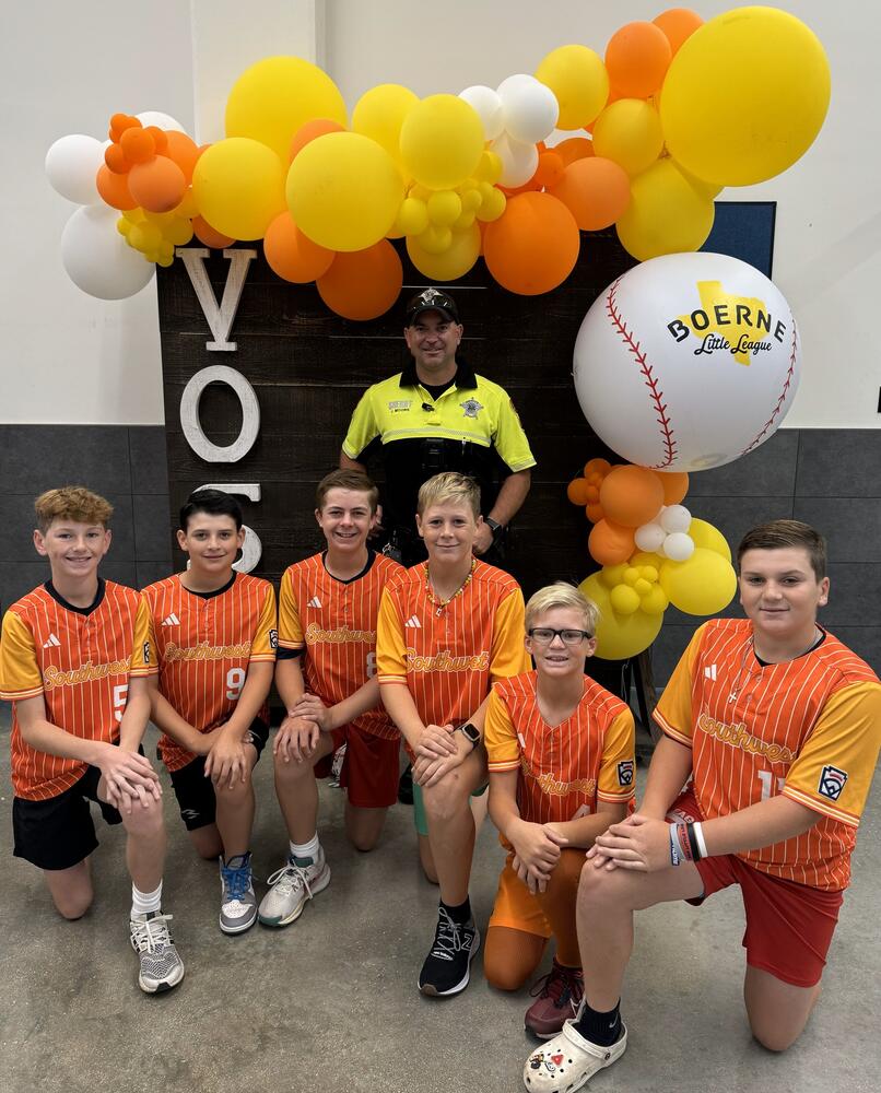 picture with sro jared moore along with the Boerne little league all star baseball team