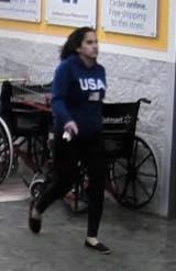 Hispanic Female Suspect Blue USA Sweatshirt Black Sweatpants 