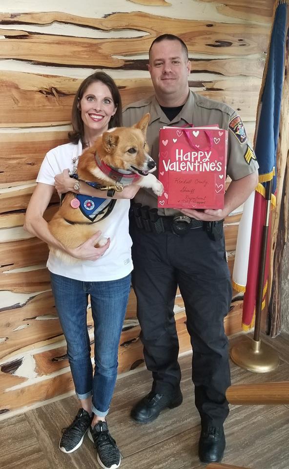 Officer with Drover the Service Dog and Lydia Smith