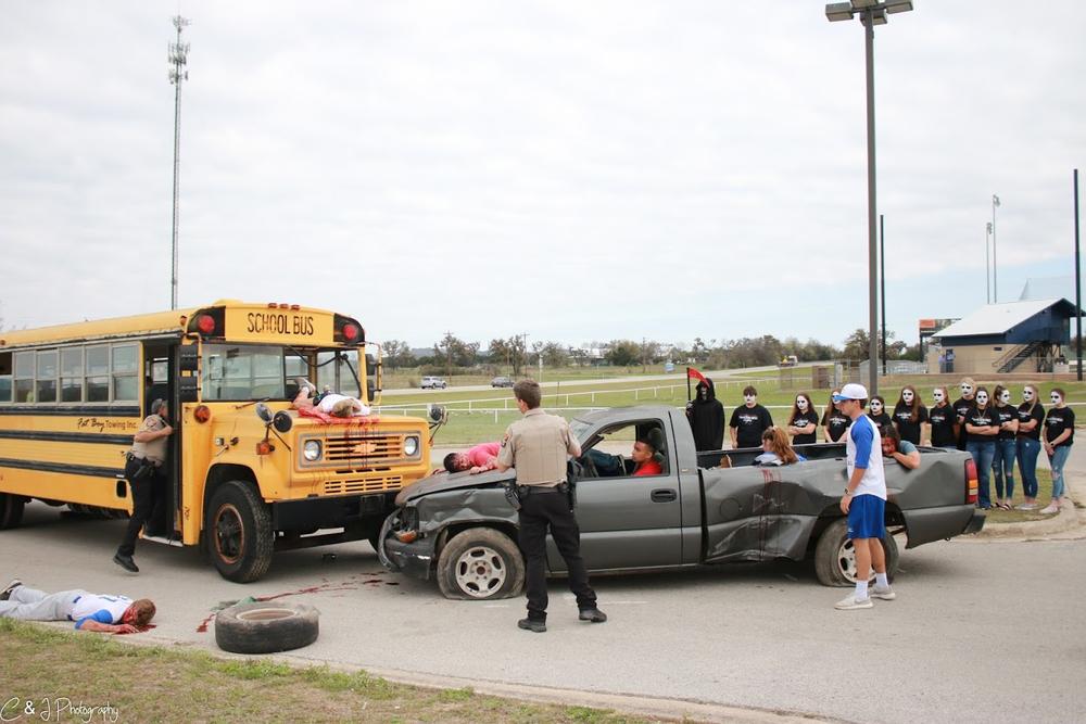 High School students and officers acting out a crash scene