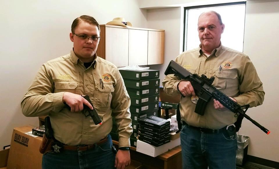 Two officers with Airsoft guns from donation 