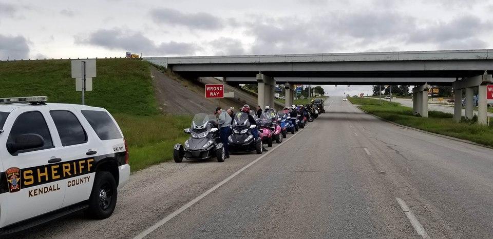 Police escort of ATV's 