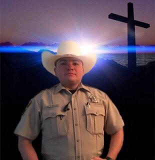 Deputy Ramirez Picture with Cross behind him