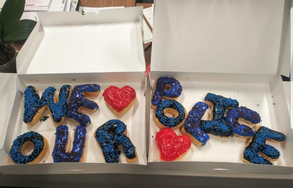 Donuts that spell We love our police 